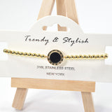 101008, ROMAN NUMERAL ACCENT ROUND STAINLESS STEEL BEADED STRETCH BRACELET