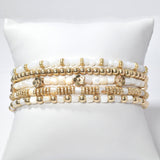 101043, DAINTY FLOWER ACCENT RESIN BEADED MULTI LAYERED STRETCH BRACELET