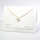 101599, 14K GOLD DIPPED, DAINTY CUTOUT ROUND CUBIC ZIRCONIA CHARM NECKLACE