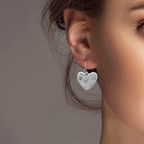 102256, HEART HAMMERED METAL EARRING