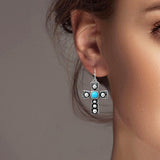 102586, WESTERN CROSS DANGLE EARRING