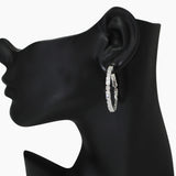 104277, 1.25" BAGUETTE CUBIC ZIRCONIA ROUND HOOP EARRING