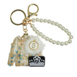 105552, SEQUIN ACCENT TWEED SWEATER WITH NUMBER 5, PURSE AND PEARL KEYCHAIN