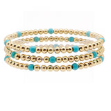 105809, SEMI PRECIOUS STONE ACCENT MULTI LAYERED BALL BEADED STRETCH BRACELET