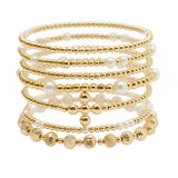 105810, CROSS BALL ACCENT PEARL MULTI LAYERED BEADED STRETCH BRACELET