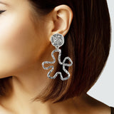 106902, CUTOUT HAMMERED PUZZLE METAL DANGLE CLIP ON EARRING