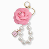 107110, FAUX LEATHER ROSE FLOWER WITH PERFUME BOTTLE CHARM PEARL KEYCHAIN AND BAG CHARM