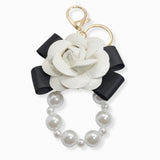 107111, FAUX LEATHER ROSE FLOWER WITH BOW PEARL KEYCHAIN AND BAG CHARM