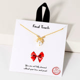 109077, FINAL TOUCH PAVE CUBIC ZIRCONIA BOW PEARL PENDANT NECKLACE