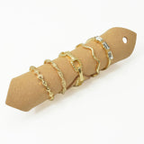 109106, SIZE 7 GOLD TONE MINIMALIST RING SET WITH BAGUETTE RHINESTONE ACCENT