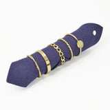 109109, SIZE 7 GOLD TONE MINIMALIST STATEMENT RING SET