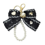 109270, NUMBER 5 FLOWER ACCENT LUXURY TWEED BOW KEYCHAIN BAG CHARM WITH PEARL LOOP