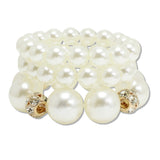 109286, CHUNKY PEARL WITH RHINESTONE FIREBALL ACCENT MULTI LAYERED STRETCH BRACELET