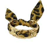 109564, GOLD HAMMERED CUFF BRACELET WITH LEOPARD PRINT FABRIC TIE
