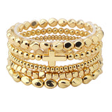 109627, SIDE CROSS ACCENT MULTI LAYERED NUGGET BEADED STRETCH BRACELET
