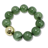 110124, CHUNKY MARBLE BEADED STRETCH BRACELET WITH GOLD ACCENT