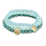 111142, HEART AND CROSS CHARM MULTI LAYERED BEADED STRETCH BRACELET wholesale fashion jewelry - GOOD FEELINGS, INC