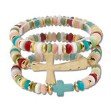 111215, HAMMERED METALLIC AND DISC BEAD CROSS MULTI LAYERED STRETCH BRACELET wholesale fashion jewelry - GOOD FEELINGS, INC