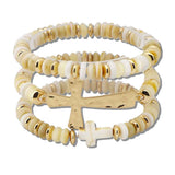 111215, HAMMERED METALLIC AND DISC BEAD CROSS MULTI LAYERED STRETCH BRACELET wholesale fashion jewelry - GOOD FEELINGS, INC