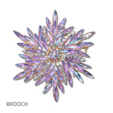 111225, CRYSTAL RHINESTONE STARBURST BROOCH PIN wholesale fashion jewelry - GOOD FEELINGS, INC