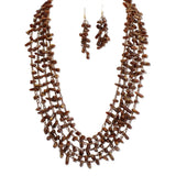 112958, MULTI STRAND WOVEN ELONGATED CHIP BEAD STATEMENT NECKLACE