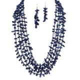 112958, MULTI STRAND WOVEN ELONGATED CHIP BEAD STATEMENT NECKLACE