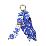 113011, GAMEDAY SPIRIT BANDANA AND FOOTBALL HELMET BAG CHARM
