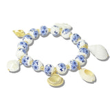 113103, PORCELAIN FLORAL CERAMIC BEAD AND SEASHELL CHARM STRETCH BRACELET