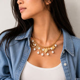 113346, HAMMERED HEART AND MULTI CHARM ECLECTIC STATEMENT NECKLACE