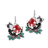AE9415-SMT_MO 56 · Enamel Holiday Cat Ornament Earrings – Silver/Multi