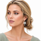 EW72497SV 7 · Pearl Cross And Heart Charm Earrings – Matt Silver/Clear Pearl
