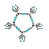 85623, WESTERN SQUASH BLOSSOM CHARM STRETCH BRACELET