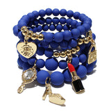 87026, HANDBAG & LIPSTICK CHARM MULTI LAYERED BEAD STRETCH BRACELET
