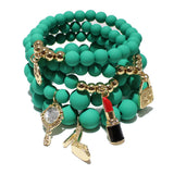 87026, HANDBAG & LIPSTICK CHARM MULTI LAYERED BEAD STRETCH BRACELET