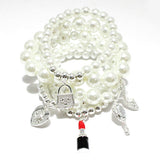 87026, HANDBAG & LIPSTICK CHARM MULTI LAYERED BEAD STRETCH BRACELET
