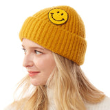87318, SOLID KNITTED BEANIE WITH SMILE PATCH