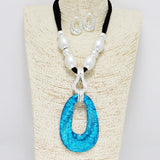 90263, GEOMETRIC CELLULOID ACETATE WITH SUEDE TRIM NECKLACE