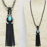 92064, WESTERN SQUASH BLOSSOM CHARM WITH LEATHER NAVAJO BEAD LONG NECKLACE
