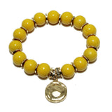 94040, HAMMERED CHARM WITH WOODEN BEAD STRETCH BRACELET
