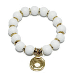 94040, HAMMERED CHARM WITH WOODEN BEAD STRETCH BRACELET