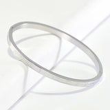 96666, ROMAN NUMERAL ACCENT STAINLESS STEEL BANGLE BRACELET