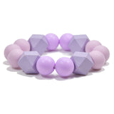 97052, RUBBER BALL WITH GEOMETRIC WOOD STRETCH BRACELET