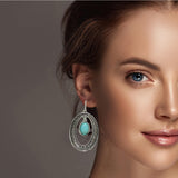 98372, WESTERN TEXTURED OVAL WITH TURQUOISE STONE EARRING
