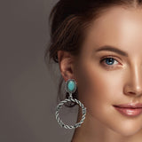 99341, WESTERN ROUND KNOT WITH TURQUOISE STONE DANGLE EARRING