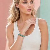 Model wearing Western Antiqued Turquoise Cabochon Row Cu