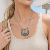 Model wearing Western Engraved Belt Buckle Turquoise Cab